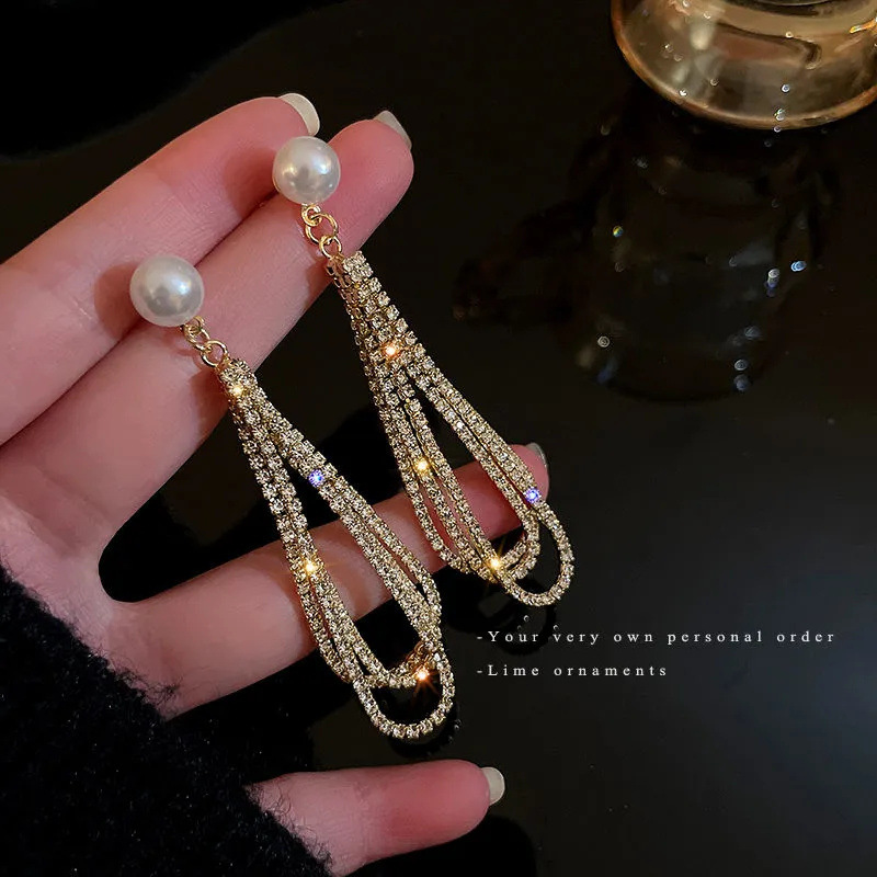 Серьги с жемчугом и кисточками оптом из Китая