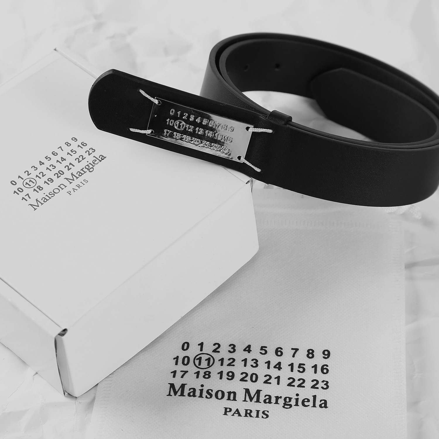 Ремень Maison Margiela MM6 с металлическим знаком оптом из Китая